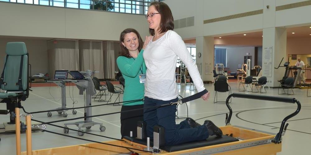 Physical therapist helping a patient